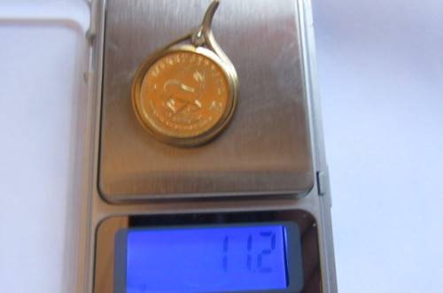 CHRISTMAS IS COMINGBEAUTIFUL FRAMED 1/4 KRUGER RAND - 1983 WITH UNKNOWN STONE - 11.2.G - AS PER SCAN