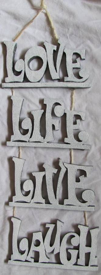 LOVE LIFE LIVE LAUGH hanging word sign with twine.resin.