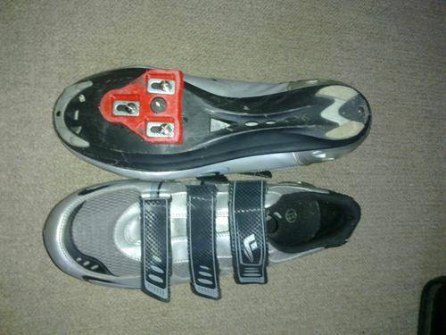 Olympic road shoes with red cleats