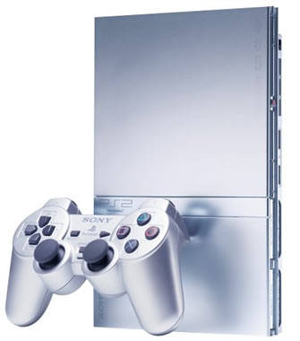 SONY PS2 SLIMLINE SILVER EDITION WITH 2 CONTROLS AND 2 GAMES