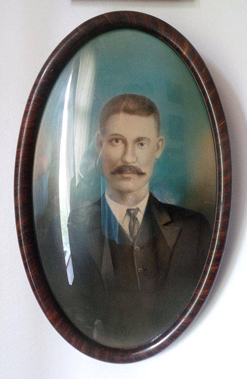A Vintage Oval Frame with Convex Glass over Portrait of a Gentleman  - In Superb Condition***