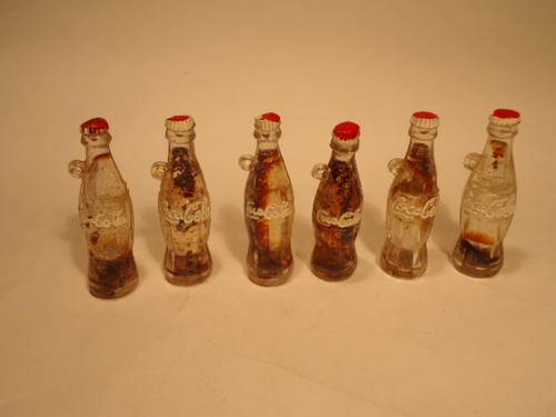 Coca Cola - A veriety of Miniature Coke Bottles