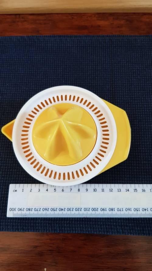 Plastic orange/lemon squeezer.