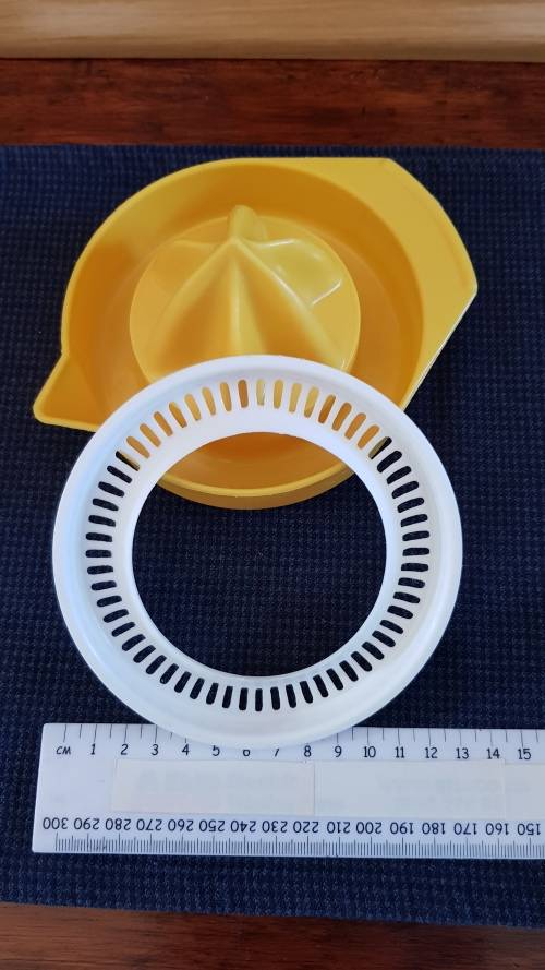 Plastic orange/lemon squeezer.