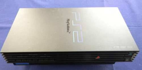 PS2 With lots of extras 3x Controllers Games and Dancing mat