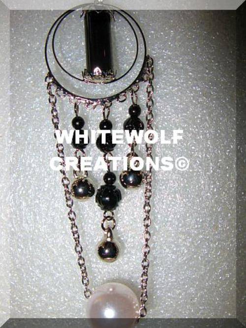 SUN NECKLACE WITH BLACK GLASS PEARL ROSES