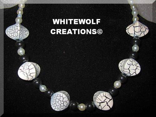 40 CM HEMATITE NECKLACE WITH 2.5 WHITE BEADS