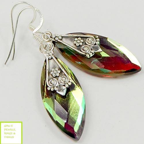 "SALE.... SALE" GENUINE MAGIC TOPAZ EARRINGS CRAFTED IN SOLID .925 STERLING SILVER