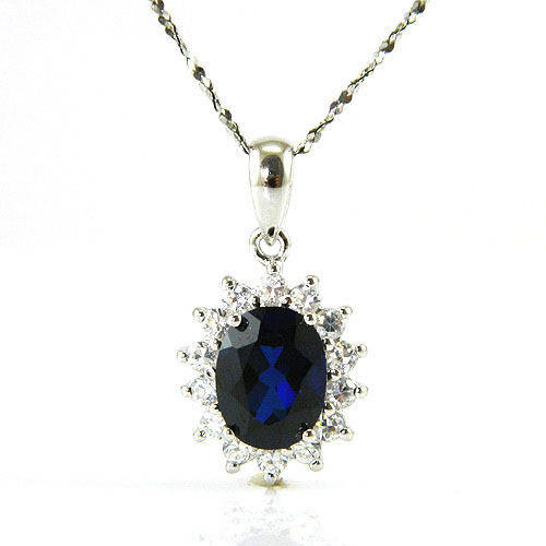 BLUE SAPPHIRE & WHITE TOPAZ CLUSTER PENDANT IN 925 STERLING SILVER