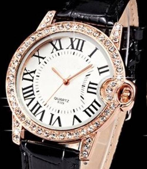 WOMANS ROSE GOLD CASE WITH WHITE ROMAN NUMERAL DIAL, CRYSTAL SURROUND AND FAUX LEATHER STRAP