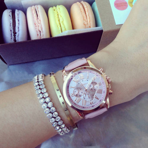 GENEVA  WOMANS PINK ROMAN NUMERALS ANALOG QUARTZ WRISTWATCH WITH FAUX LEATHER STRAP