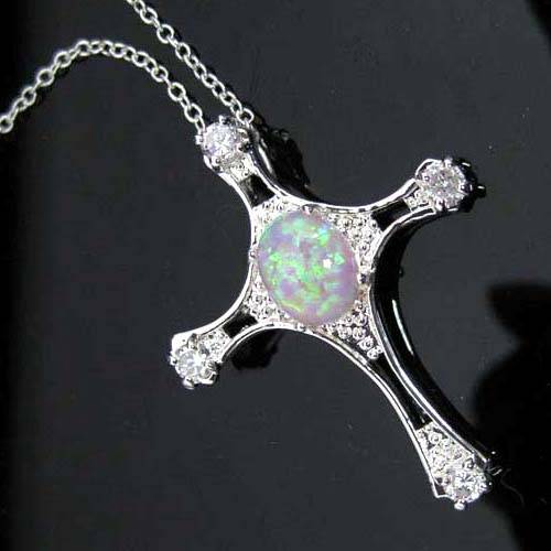 SIMULATED PINK OPAL SET IN CROSS PENDANT CRAFTED FROM HALLMARKED .925 SILVER