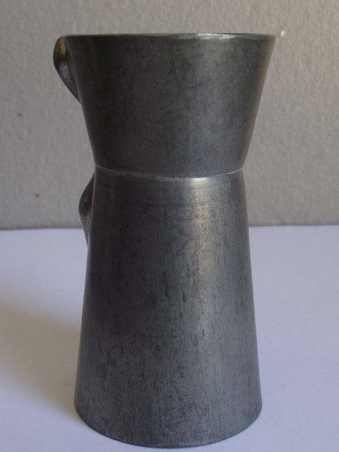 CARROL BOYES MAN DESIGN PEWTER AND ALUMINIUM TOT MEASURE