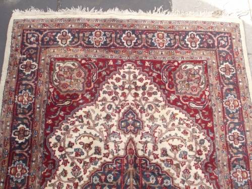 HAND WOVEN PERSIAN CARPET HAS AGE RELATED WEAR