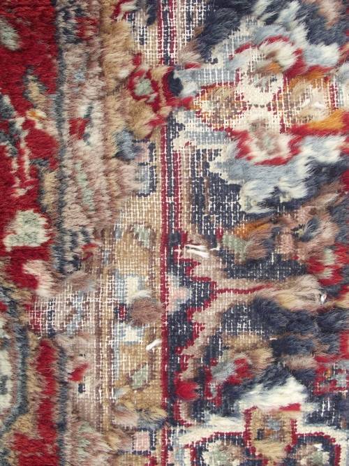HAND WOVEN PERSIAN CARPET HAS AGE RELATED WEAR