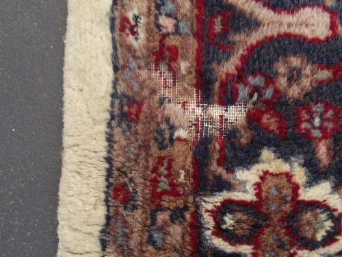 HAND WOVEN PERSIAN CARPET HAS AGE RELATED WEAR