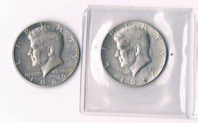1967 US half dollar in pouch and 1966 US half dollar used (40% silver)