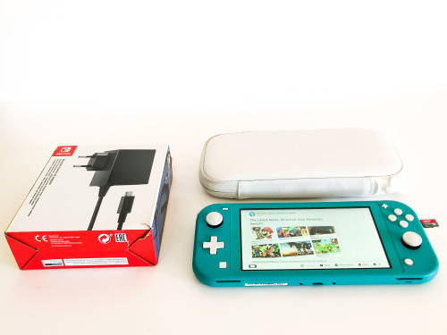 Nintendo Switch Lite (Turquoise) Including Carry Case, 64GB Memory Card & Official Charger Like New!