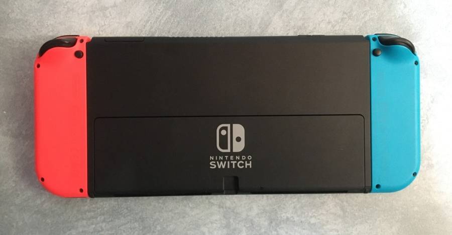 Nintendo Switch OLED Model HEG-001  64GB - Neon Red / Blue Boxed Great Condition!