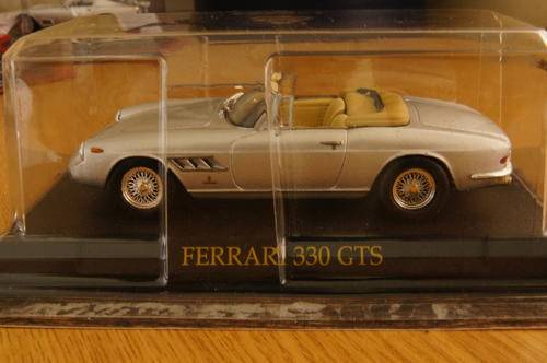 Ferrari 330 GTS diecast model car 1:43 on base
