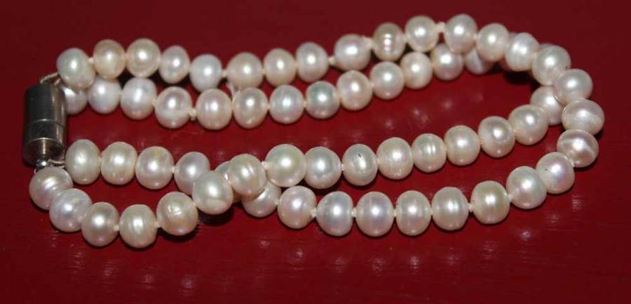 Beautiful double string genuine fresh water pearl bracelet.