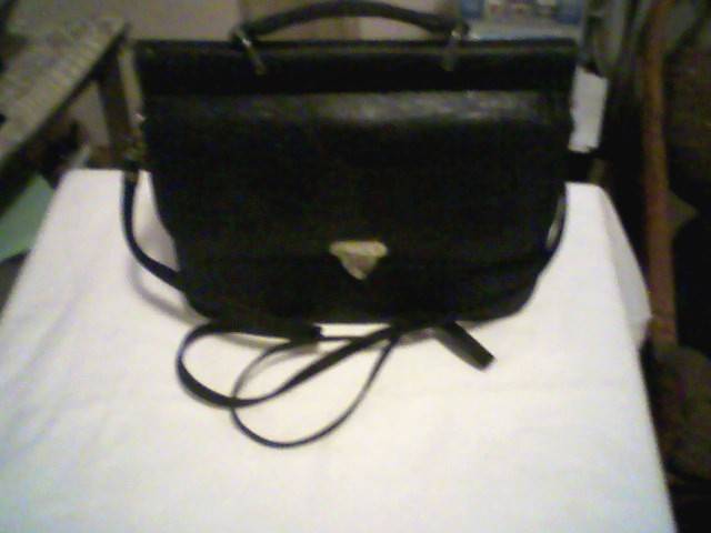 BLACK LEATHER HANDBAG. VERY UNIQUE OPENS ON BOTH SIDES.