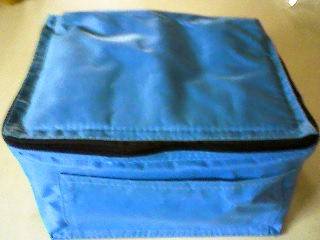6 PACK COOLER BAG. BLUE AND BLACK. WITH FRONT POCKET.