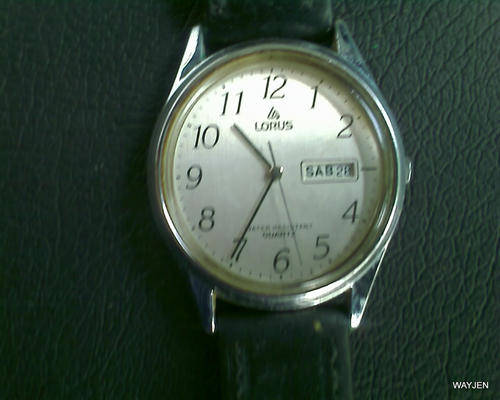 LORUS WATCH. PLASTIC BACK. NOT WORKING