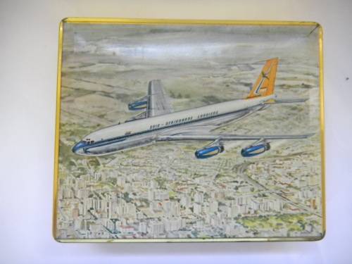 Assorted Military Badges and Insignia in collectible tin