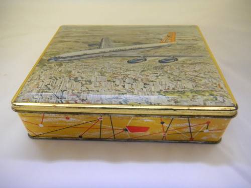 Assorted Military Badges and Insignia in collectible tin