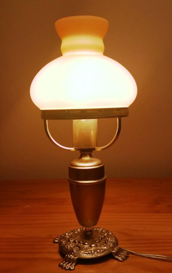 BRASS AND GILT TABLE LAMP WITH STUDENT SHADE