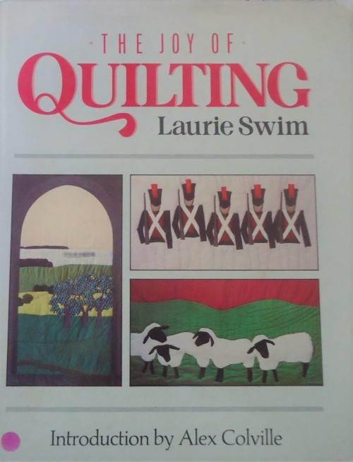 THE JOY OF QUILTING-LAURIE SWIM-100 PG HARDCOVER+DUSTJACKET-SPINE WORN