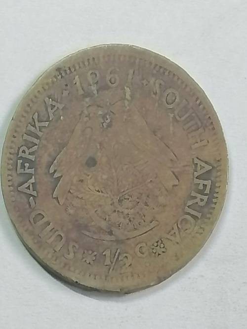 1961 HALF CENT UNION OF SOUTH AFRICA, COIN HAS ASTRANGE OVAL SHAPE,NOT SURE IF EEROR COIN.