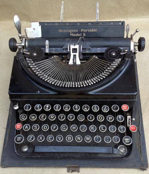 Portable Model 5....all there, keys work with super sound, needs service....postage R60.00