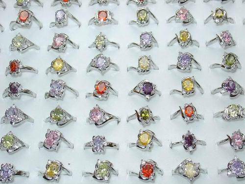 AMAZING CZ STONES IN VARIOUS COLORS SET IN PLATED SILVER