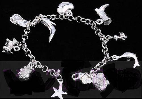 Lovely 10 Charms 925 sterling silver bracelet  19cm
