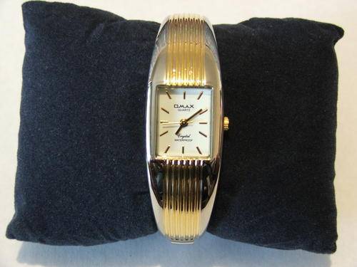 ****VERY ELEGANT!!!***SILVER AND GOLD BANGLE WATCH FROM THE OMAX COLLECTION!!!