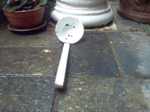 OLD WHITE ENAMEL LADLE.