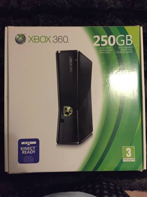 Xbox 360 slim 250G , 3 remotes , one charger , one steering wheel and 23 games