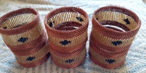 Elegant copper wire serviette rings, set of 6. As new.