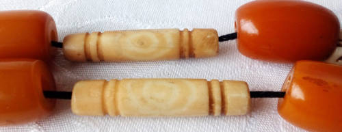 UPCYCLED  BEAD NECKLACE, USING 11 VINTAGE BUTTERSCOTCH BAKELITE BEADS, BONE, AND METAL