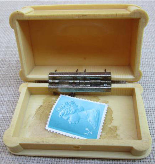 ANTIQUE / VINTAGE CELLULOID POSTAGE STAMP HOLDER,