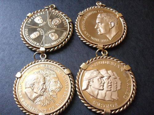 4xRhodesian coins!!  UNRESEARCHED!! R1 START!! 1 BID FOR ALL!!