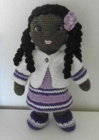 Crocheted african doll-