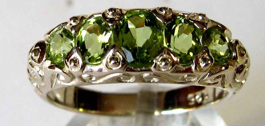 Lovely, Sterling Silver and Genuine Peridots Ring.