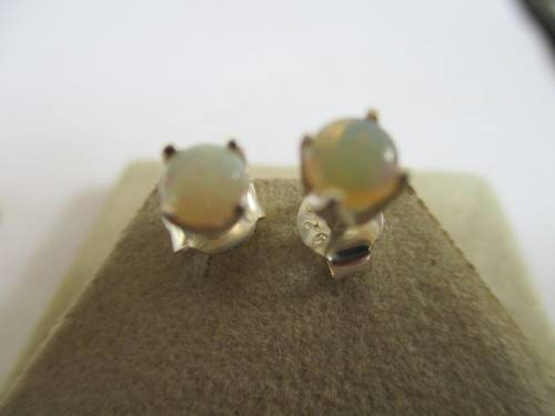 A Pair of Sterling Silver and Australian Opals Earrings