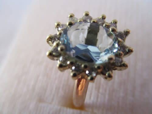 A 18ct Yellow  Gold Aquamarine and Diamonds Ring