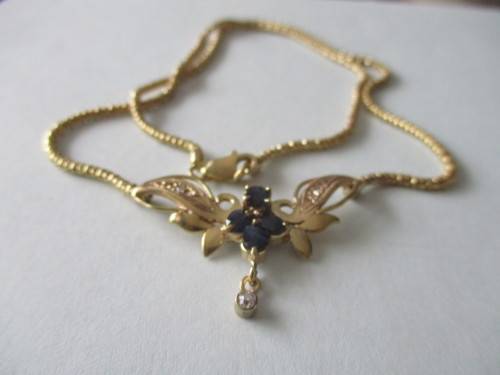 9ct. Solid  Yellow  Gold Necklace with Blue Sapphire and Diamonds