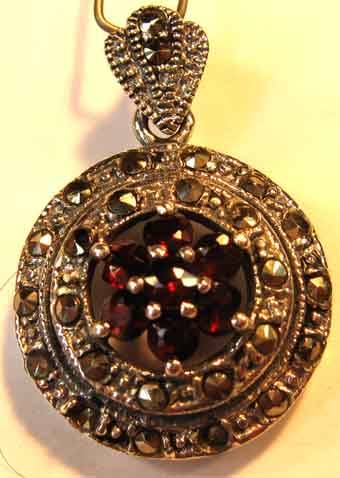 Beautiful Sterling Silver , Marcasite and Garnets Pendant.