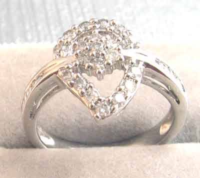 Genuine 18K Solid white Gold and genuine Natural Diamonds Ring.